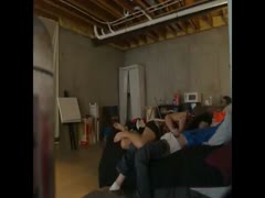 In her hotel room, a brunette doxy puts her black cock in her throat.